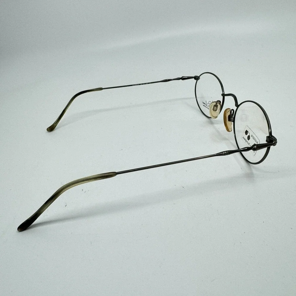 Kenmark Eyeglasses Frames Gallery‎ Silver Round Tortoise 49-20-140 H11133